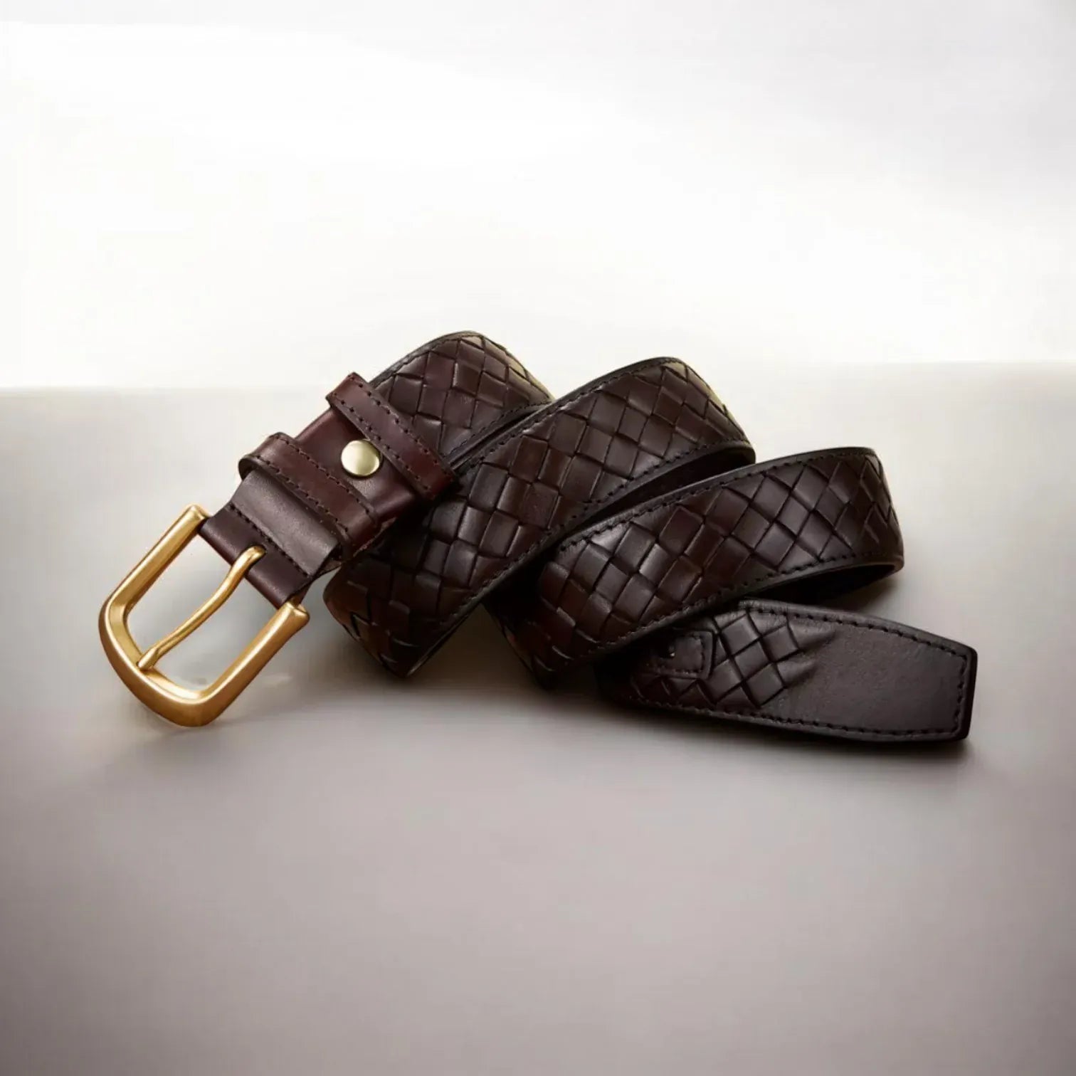 Ceinture tressée en cuir homme avec surpiqûres