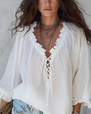 Blouse col V lacets