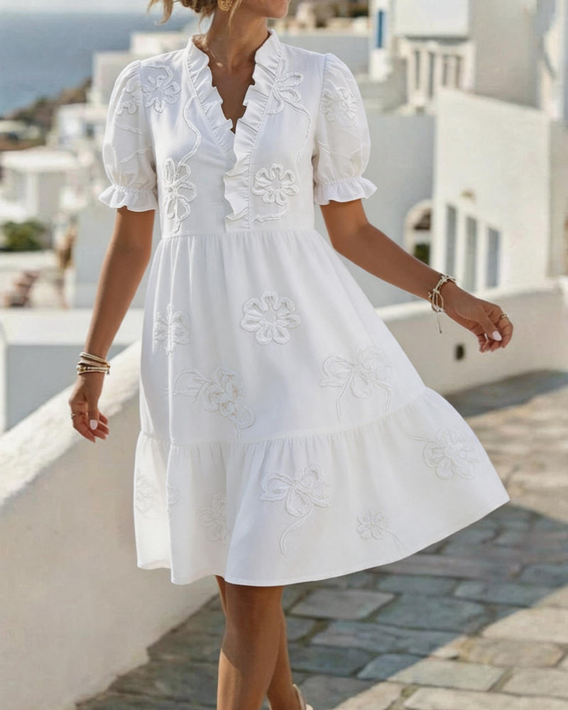 Robe courte florale à manches bouffantes
