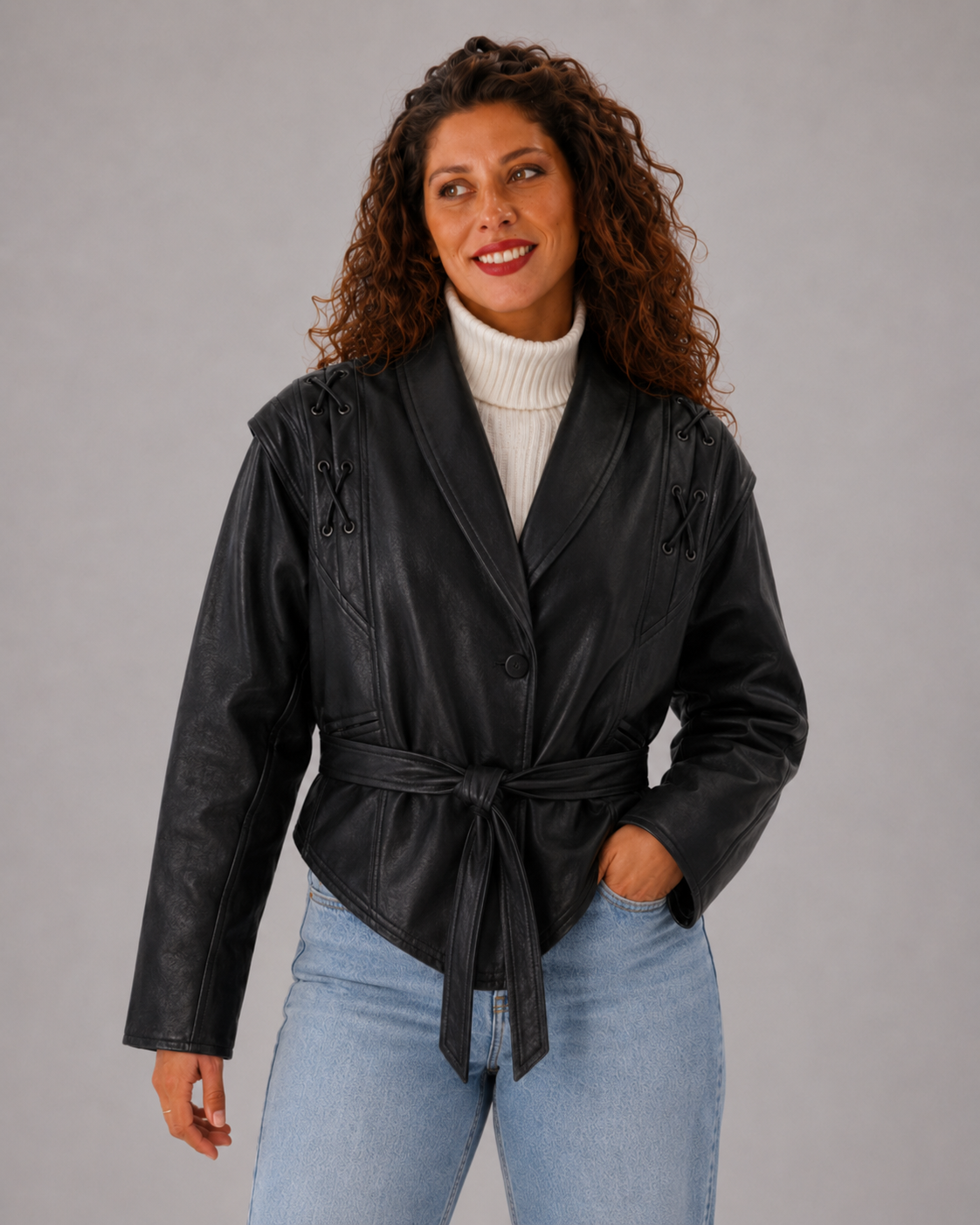 Veste femme courte en simili cuir à ceinture