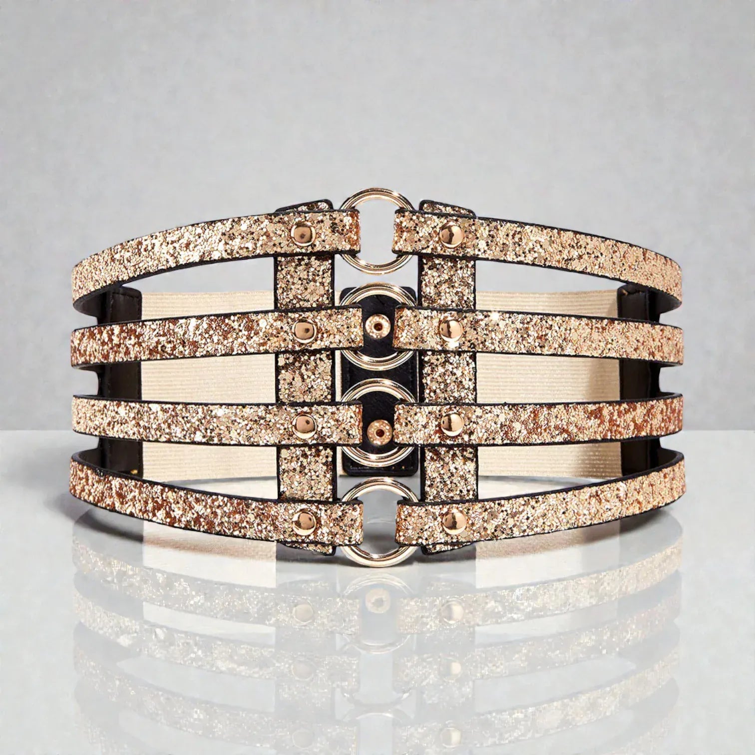 Ceinture pour femme dorée avec 4 rangées de boucles et largeur 10 cm