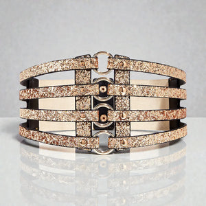 Ceinture pour femme dorée avec 4 rangées de boucles et largeur 10 cm