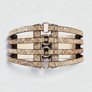 Ceinture pour femme dorée avec 4 rangées de boucles et largeur 10 cm
