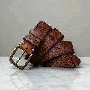 Ceinture en cuir texturé homme avec motif serpent