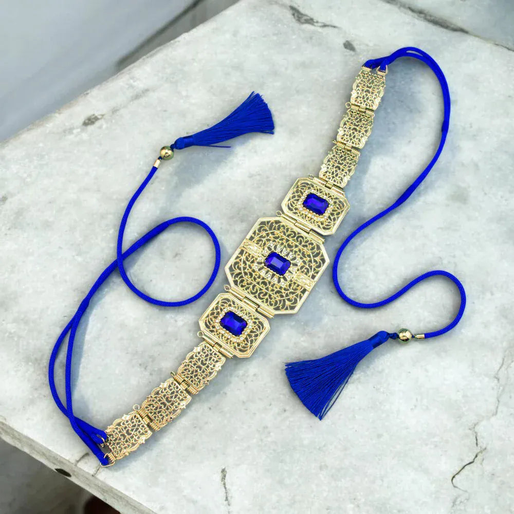 Ceinture pour femme en métal ajouré avec plaque géométrique