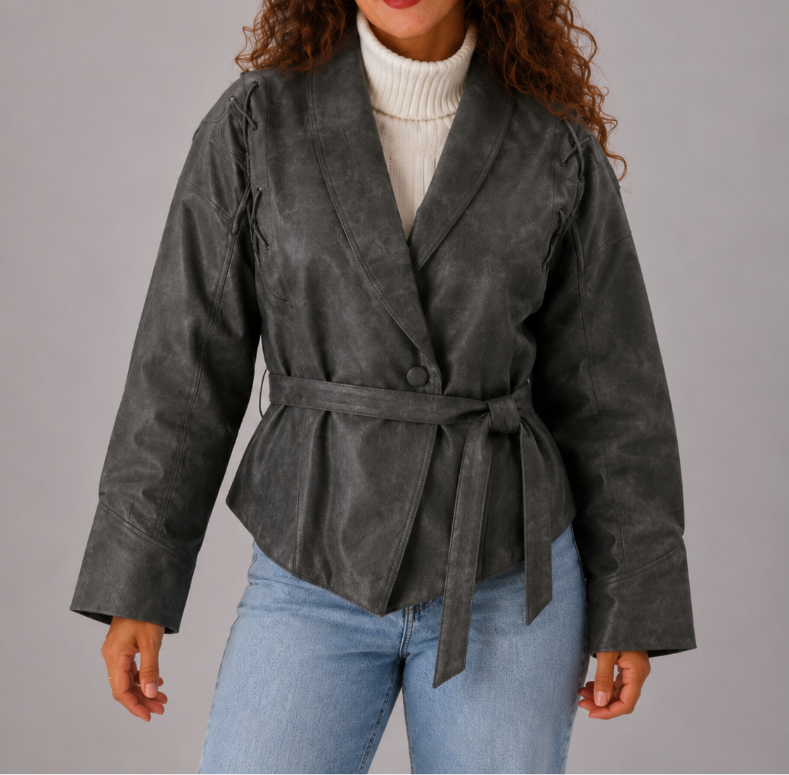 Veste femme courte en simili cuir à ceinture