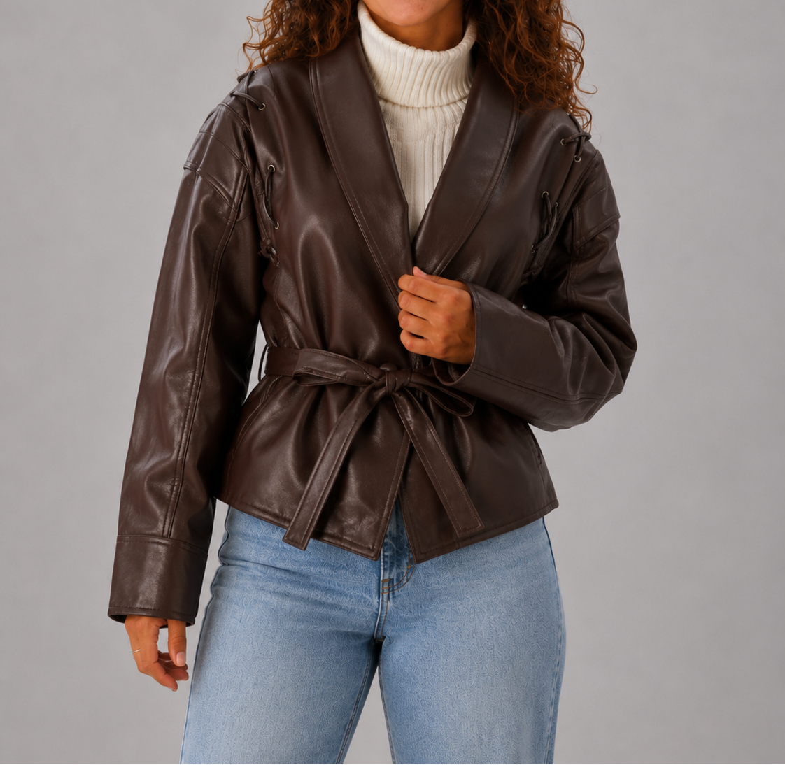 Veste femme courte en simili cuir à ceinture
