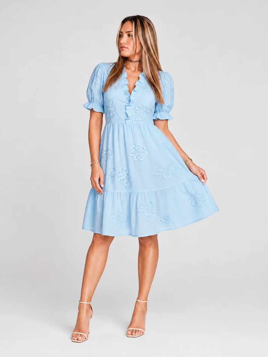 Robe courte florale à manches bouffantes